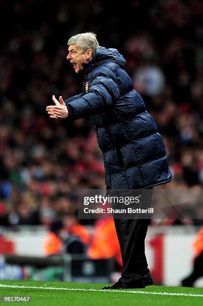 Arsene Wenger the Arsenal manager shouts instructions from the sidelines during the UEFA Champions League quarter final first leg match between...