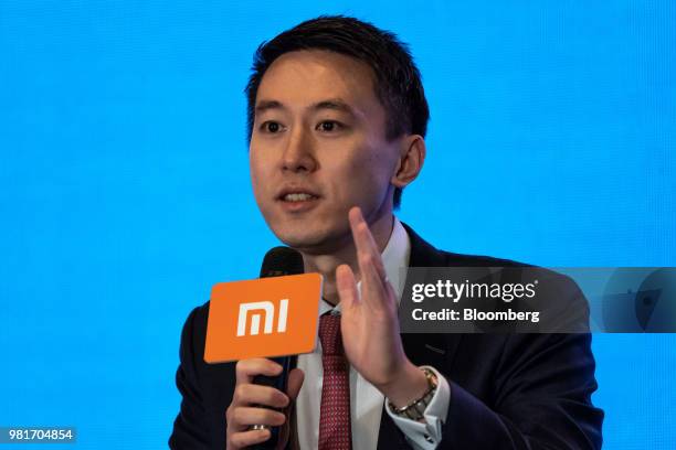 Chew Shou Zi, senior vice president and chief financial officer of Xiaomi Corp., speaks during a news conference in Hong Kong, China, on Saturday,...