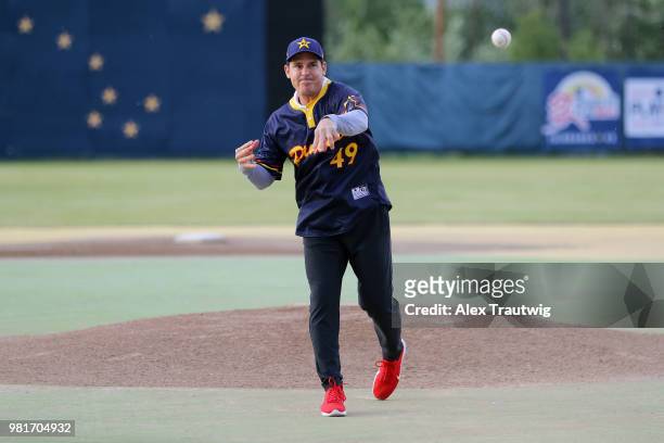 Billy Bean, Vice President & Special Assistant to the Commissioner throws out the ceremonial first pitch for the 113th Midnight Sun Game between the...