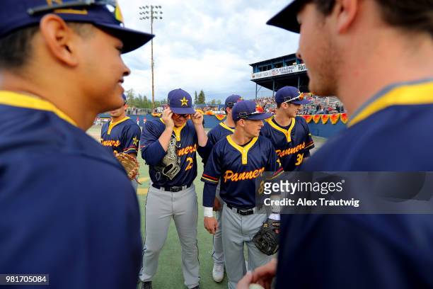 The Alaska Goldpanners huddle prior to the 113th Midnight Sun Game against the Orange County Surf at Growden Park on Thursday, June 21, 2018 in...