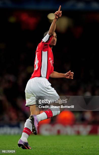 Theo Walcott of Arsenal celebrates after scoring a goal during the UEFA Champions League quarter final first leg match between Arsenal and FC...