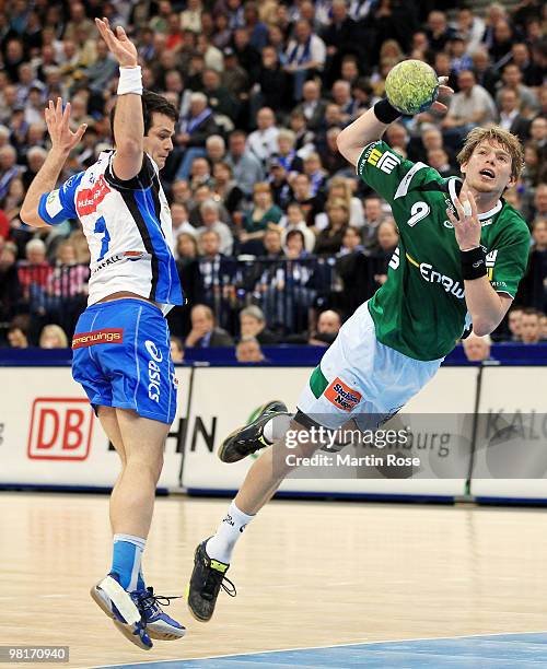 Matthias Flohr of Hamburg and Manuel Spaeth of Goeppingen battle for the ball during the Bundesliga match between HSV Hamburg and FA Goeppingen at...