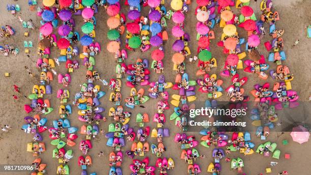 aerial view of the kuta beach in bali, indonesia. - denpasar fotografías e imágenes de stock