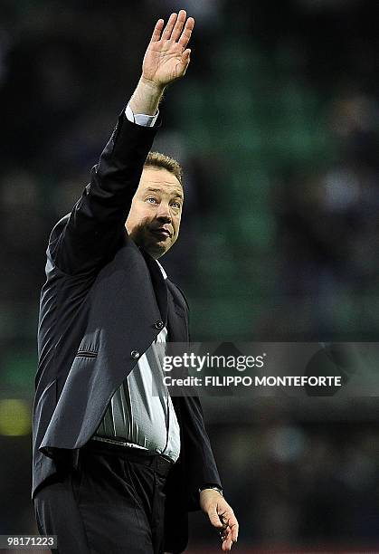 Moscow's coach Leonid Slutsky waves to fans at the end of their UEFA Champions League football match between Inter Milan and Cska Moscow at San Siro...