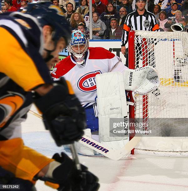 Carey Price of the Montreal Canadiens keeps his eyes on Paul Gaustad of the Buffalo Sabres on March 24, 2010 at HSBC Arena in Buffalo, New York.