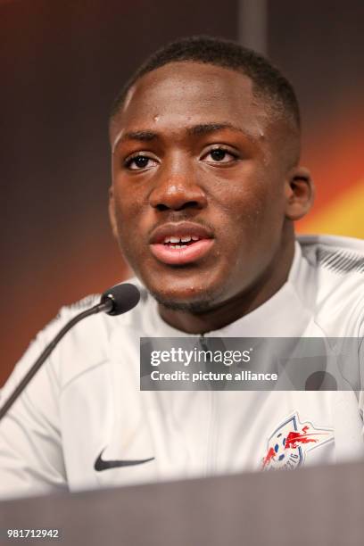 April 2018, Germany, Leipzig: Ibrahima Konate takes part in a press conference of his team RB Leipzig. Leipzig will face off against Olympique...