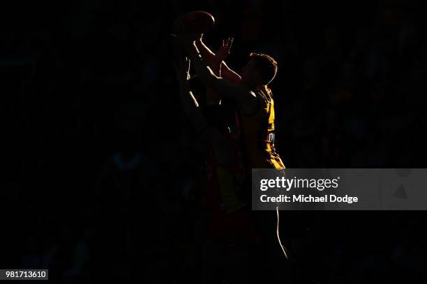 Tim O'Brien of the Hawks competes for the ball during the round 14 AFL match between the Hawthorn Hawks and the Gold Coast Suns at University of...