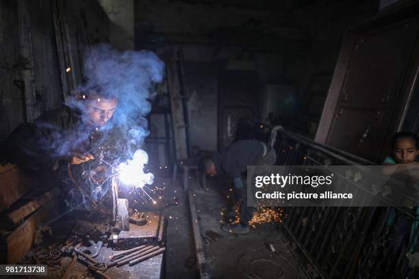 Palestinian blacksmith Ali Banat makes "Keys of Return", which symbolizes the right of Palestinian refugees to return to homes they were expelled...