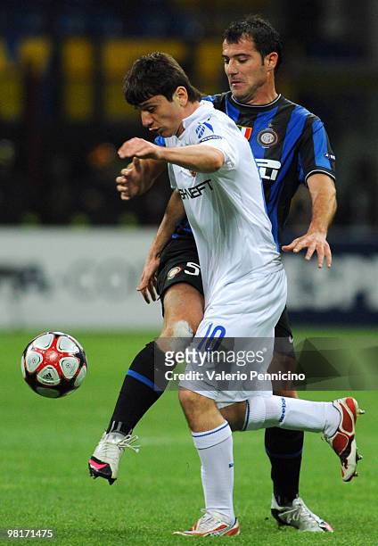 Dejan Stankovic of FC Internazionale Milano battles for the ball with Alan Dzagoev of CSKA Moscow during the UEFA Champions League Quarter Finals,...