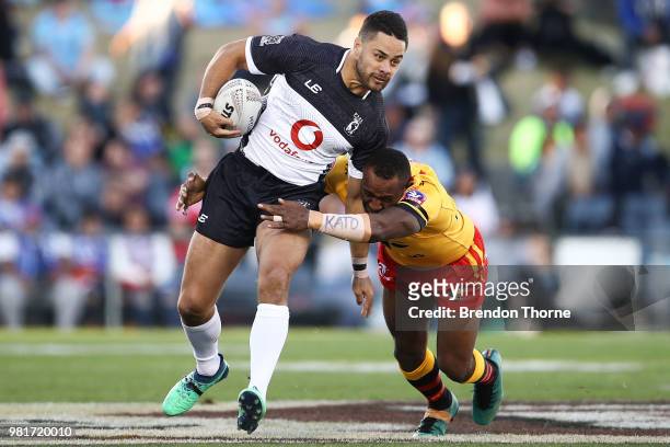 Jarryd Hayne of Fiji is tackled by the PNG defence during the 2018 Pacific Test Invitational match between Fiji and Papua New Guinea at Campbelltown...