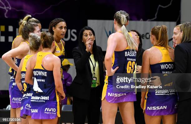 Coach Noeline Taurua of the Lightning talks to her players during a timeout in the round eight Super Netball match between the Lightning and the...