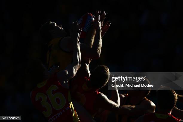 Ben McEvoy of the Hawks competes for the ball during the round 14 AFL match between the Hawthorn Hawks and the Gold Coast Suns at University of...
