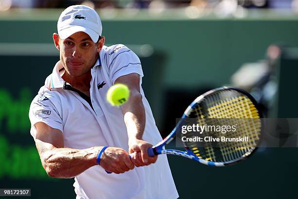 Andy Roddick of the United States returns a shot against Nicolas Almagro of Spain during day nine of the 2010 Sony Ericsson Open at Crandon Park...