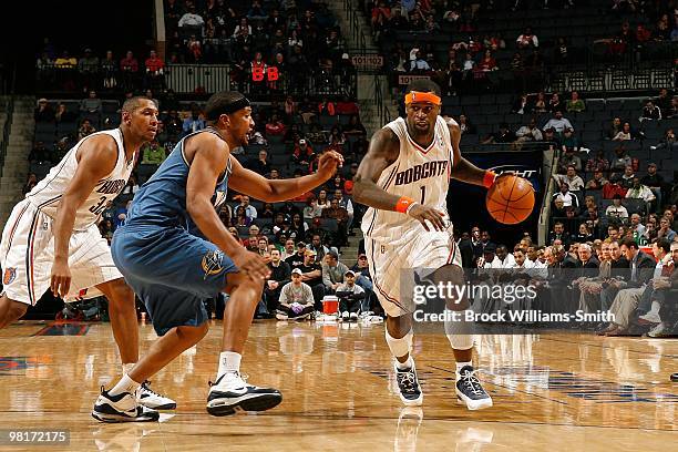 Stephen Jackson of the Charlotte Bobcats moves the ball against Dominic McGuire of the Washington Wizards during the game on February 9, 2010 at the...