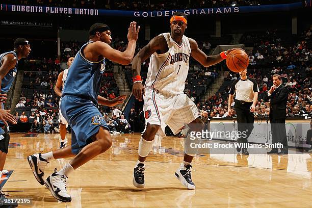 Stephen Jackson of the Charlotte Bobcats moves the ball against Dominic McGuire of the Washington Wizards during the game on February 9, 2010 at the...