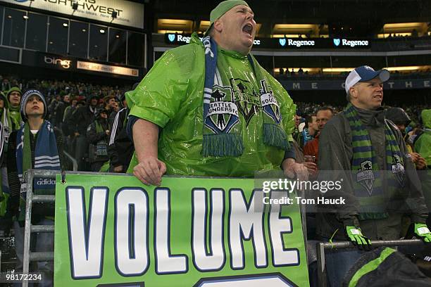 Fans of the Seattle Sounders FC cheer against the Philadelphia Union at Qwest Field on March 25, 2010 in Seattle, Washington. The Sounders defeated...