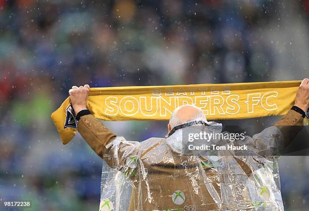 Fan of the Seattle Sounders FC cheers against the Philadelphia Union at Qwest Field on March 25, 2010 in Seattle, Washington. The Sounders defeated...