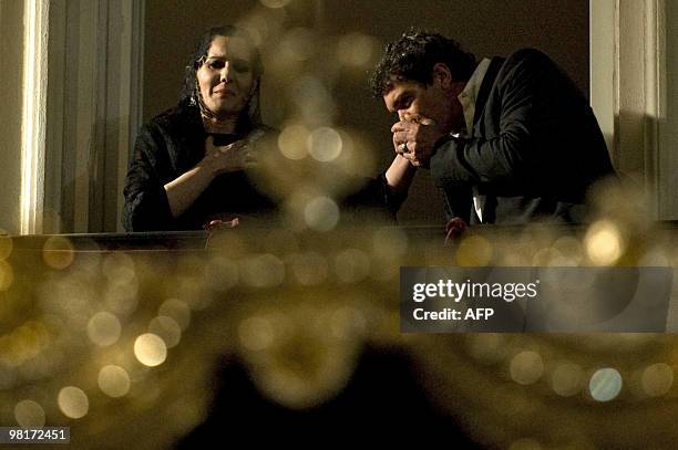 Spanish actor Antonio Banderas kisses the hand of Spanish singer Diana Navarro after she perofrmed a "saeta" during the "Fusionadas" brotherhood...