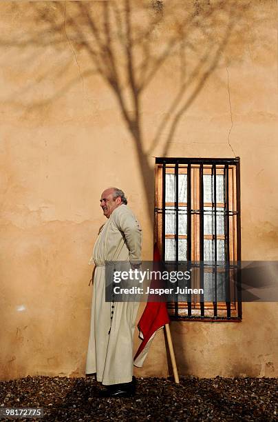 Penitent of the Cofradia del Silencio gets dressed for a Holy Week procession on March 31, 2010 in Zamora, Spain. Easter week is celebrated with...