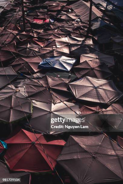 market umbrellas - modern vietnam stock pictures, royalty-free photos & images