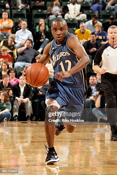 Earl Boykins of the Washington Wizards drives the ball downcourt against the Indiana Pacers during the game on March 24, 2010 at Conseco Fieldhouse...