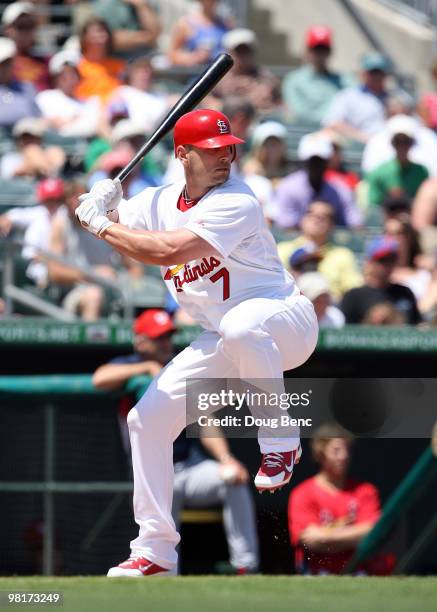 Matt Holliday of the St Louis Cardinals hits against the Washington Nationals at Roger Dean Stadium on March 31, 2010 in Jupiter, Florida.