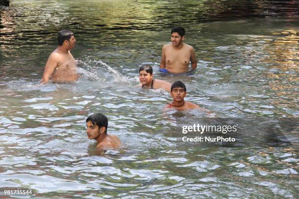 Kids enjoying swimming at Tulmulla during Mela Kher bhawani in Ganderbal, some 28 km northeast of Srinagar, on 20 June 2018. Thousands of Hindu...