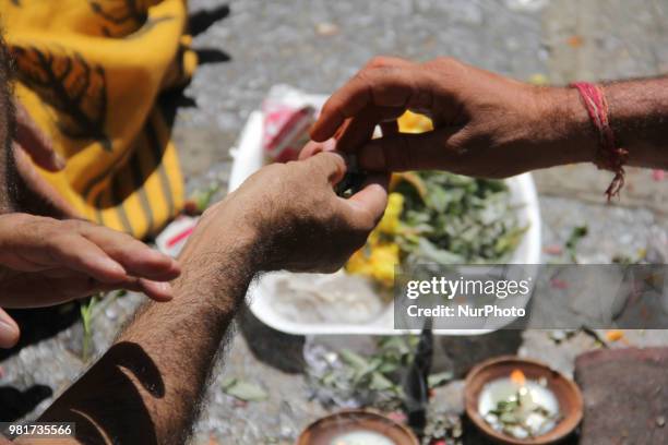 Devotees at mela kher bhawani in Ganderbal, some 28 km northeast of Srinagar, on 20 June 2018. Thousands of Hindu devotees attended the prayers in...
