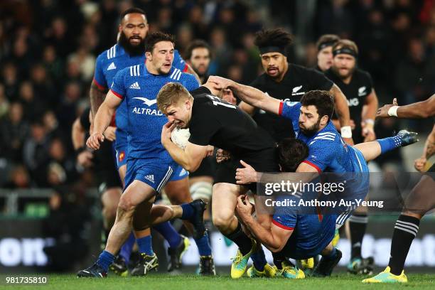 Jack Goodhue of the All Blacks makes a break during the International Test match between the New Zealand All Blacks and France at Forsyth Barr...