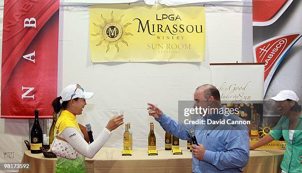 Hee Kyung Seo of South Korea winner of the Kia Classic the week before is congratulated by David Mirassou the owner of Mirassou Winery as Juli...