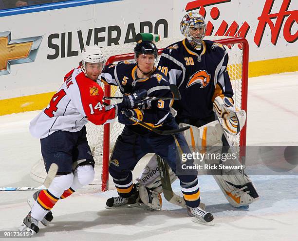 Toni Lydman and Ryan Miller of the Buffalo Sabres defend against Radek Dvorak of the Florida Panthers at HSBC Arena on March 31, 2010 in Buffalo, New...