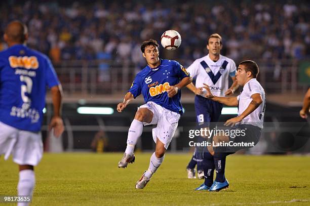Kleber of Brazil's Cruzeiro vies for the ball with player of Argentina's Velez Sarsfield during a match as part of the Libertadores Cup 2010 at...