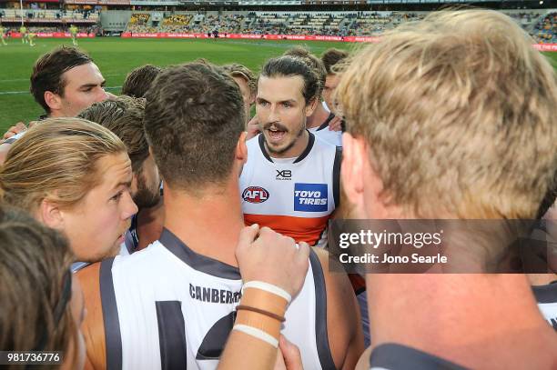 Phil Davis of the Giants talks to his team during the round 14 AFL match between the Brisbane Lions and the Greater Western Sydney Giants at The...