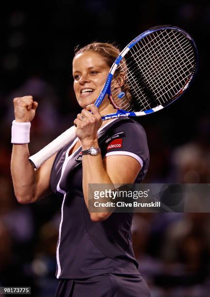 Kim Clijsters of Belgium celebrates after defeating Samantha Stosur of Australia in straight sets during day nine of the 2010 Sony Ericsson Open at...