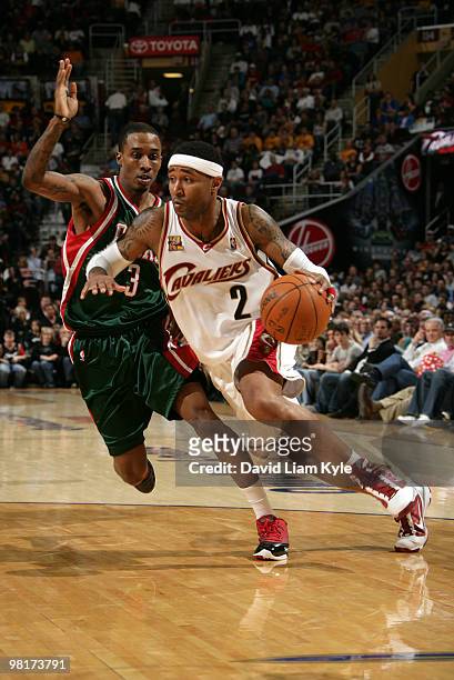 Mo Williams of the Cleveland Cavaliers drives to the basket past Brandon Jennings of the Milwaukee Bucks on March 31, 2010 at The Quicken Loans Arena...