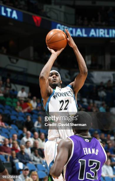 Corey Brewer of the Minnesota Timberwolves shoots over Tyreke Evans of the Sacramento Kings during the game on March 31, 2010 at the Target Center in...