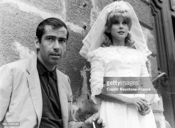 The film-maker Roger VADIM and the actress Catherine DENEUVE, his partner, shooting the wedding scene of the film LE VICE ET LA VERTU in 1962.