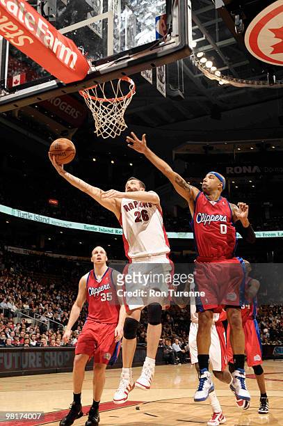 Hedo Turkoglu of the Toronto Raptors cuts to the basket for the layup past Drew Gooden of the Los Angeles Clippers during a game on March 31, 2010 at...