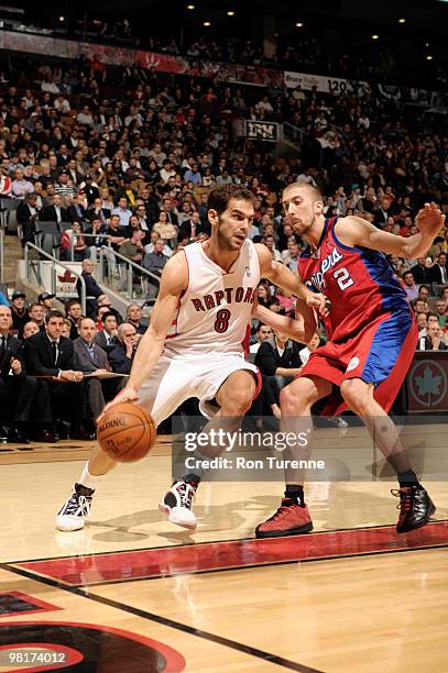 Jose Calderon of the Toronto Raptors drives to the hoop past Steve Blake of the Los Angeles Clippers during a game on March 31, 2010 at the Air...