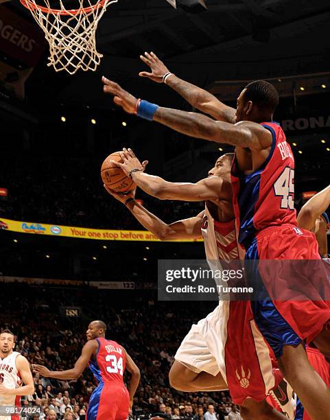 DeMar DeRozan of the Toronto Raptors drives hard to the basket for the layup attempt defended by Rasual Butler of the Los Angeles Clippers during a...