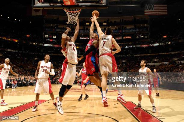 Drew Gooden of the Los Angeles Clippers gets his shot blocked by Andrea Bargnani of the Toronto Raptors during a game on March 31, 2010 at the Air...