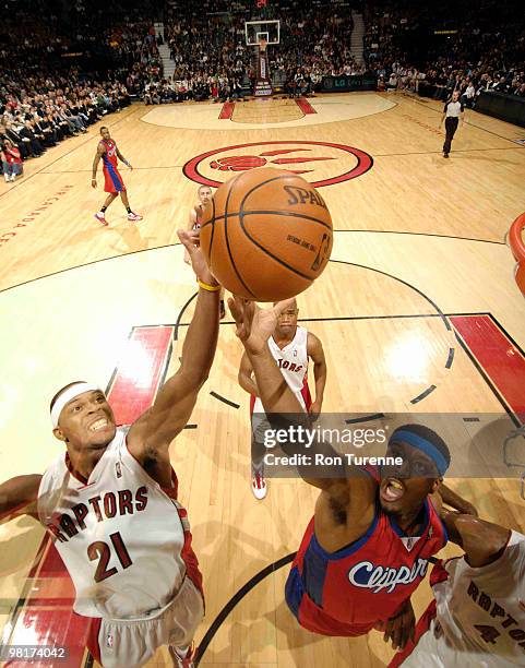 Antoine Wright of the Toronto Raptors battles for the board with Craig Smith of the Los Angeles Clippers during a game on March 31, 2010 at the Air...