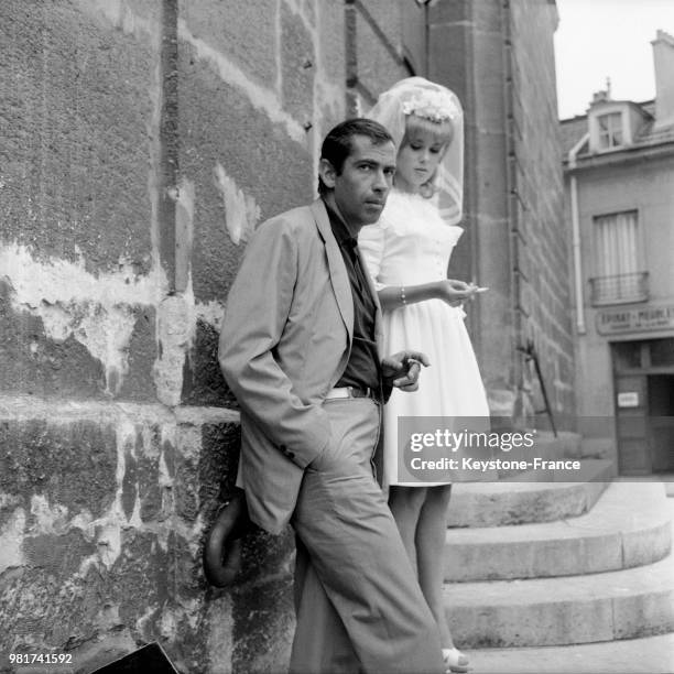 Le réalisateur Roger VADIM et l'actrice Catherine DENEUVE, sa compagne, tournent la scène du mariage du film LE VICE ET LA VERTU en 1962.