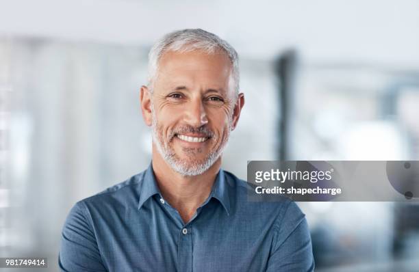 positive and professional, everything you want in an entrepreneur - mature men stock pictures, royalty-free photos & images