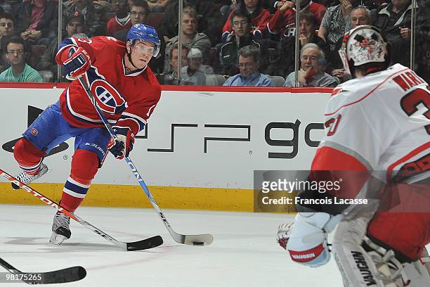 Mike Cammalleri of Montreal Canadiens takes a shot on goalie Cam Ward of the Carolina Hurricanes during the NHL game on March 31, 2010 at the Bell...