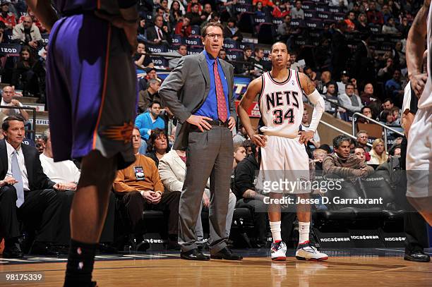 Head Coach Kiki Vandeweghe and Devin Harris of the New Jersey Nets talk during the game against the Phoenix Suns on March 31, 2010 at the Izod Center...