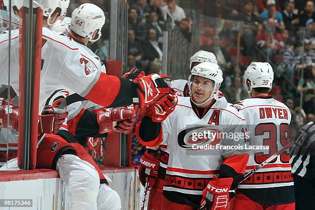 Ray Whitney of the Carolina Hurricanes celebrates a goal with teammates during the NHL game against the Montreal Canadiens on March 31, 2010 at the...