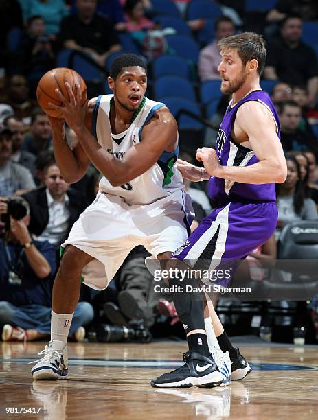 Ryan Gomes of the Minnesota Timberwolves looks to pass the ball against Andres Nocioni of the Sacramento Kings during the game on March 31, 2010 at...