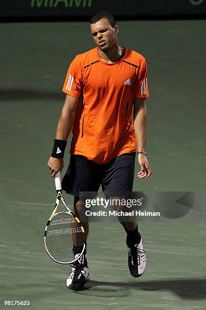Jo-Wilfried Tsonga of France reacts after a shot against Rafael Nadal of Spain during day nine of the 2010 Sony Ericsson Open at Crandon Park Tennis...