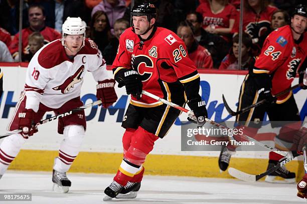 Robyn Regehr of the Calgary Flames skates against Shane Doan of the Phoenix Coyotes on March 31, 2010 at Pengrowth Saddledome in Calgary, Alberta,...